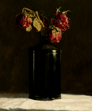 Rode rozen in zwarte fles 